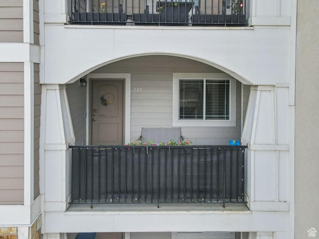 217 W Ridge Rd, Saratoga Springs, UT 84045 - view of exterior entry with a balcony