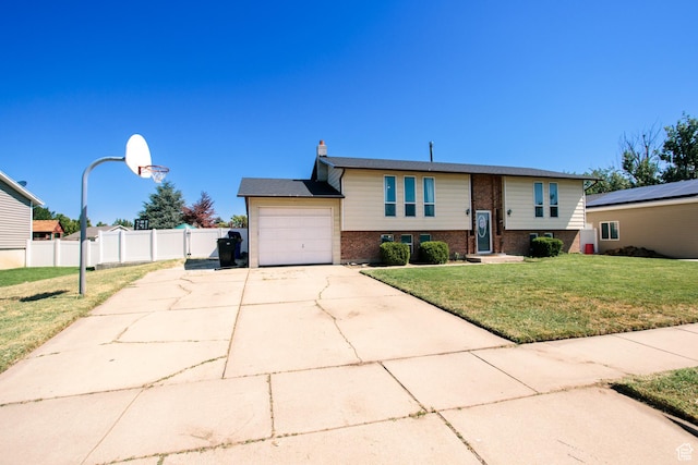 2080 W 2175 S, Syracuse, UT 84075 - split foyer home with a garage, brick siding, driveway, and a chimney