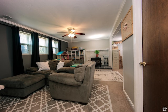 2080 W 2175 S, Syracuse, UT 84075 - living area featuring a wood stove, a ceiling fan, crown molding, and carpet flooring