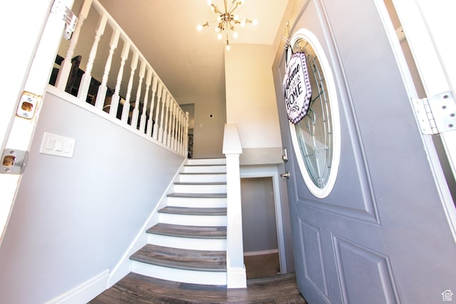 2080 W 2175 S, Syracuse, UT 84075 - foyer featuring wood finished floors, stairway, and a chandelier
