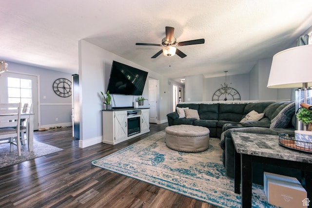 2080 W 2175 S, Syracuse, UT 84075 - living area featuring dark wood-style floors, ceiling fan, a chandelier, and a textured ceiling
