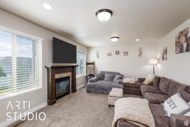 2185 N 250 W, Harrisville, UT 84414 - living room with light carpet, a glass covered fireplace, and recessed lighting