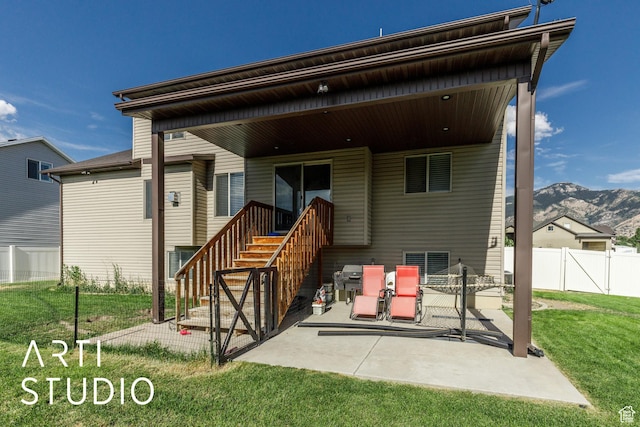 2185 N 250 W, Harrisville, UT 84414 - back of house with a patio area and a mountain view