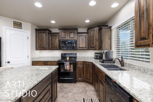 2185 N 250 W, Harrisville, UT 84414 - kitchen with black appliances, dark brown cabinets, light stone counters, and recessed lighting