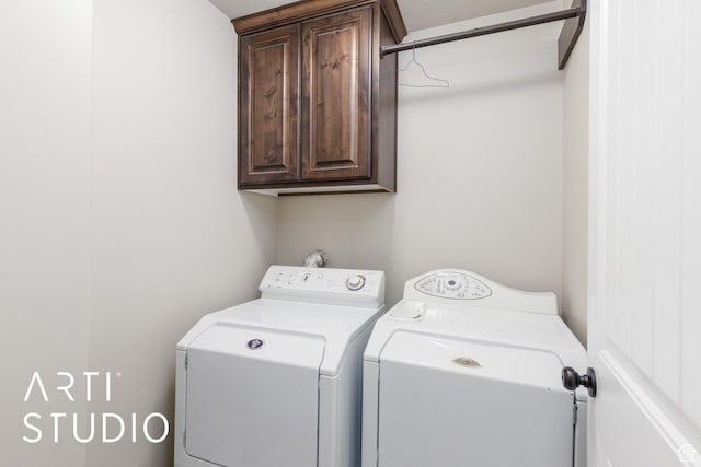 2185 N 250 W, Harrisville, UT 84414 - washroom with cabinet space and washing machine and clothes dryer
