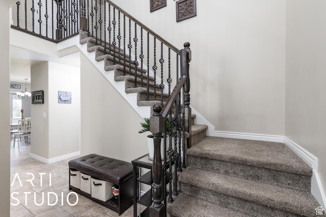 2185 N 250 W, Harrisville, UT 84414 - stairs with baseboards and a chandelier