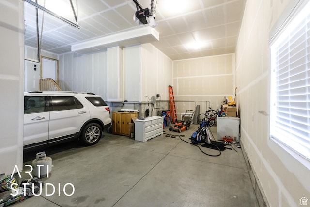 2185 N 250 W, Harrisville, UT 84414 - garage featuring a garage door opener