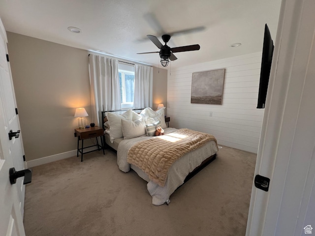 409 N 200 W, Brigham City, UT 84302 - bedroom featuring carpet floors, wooden walls, and a ceiling fan