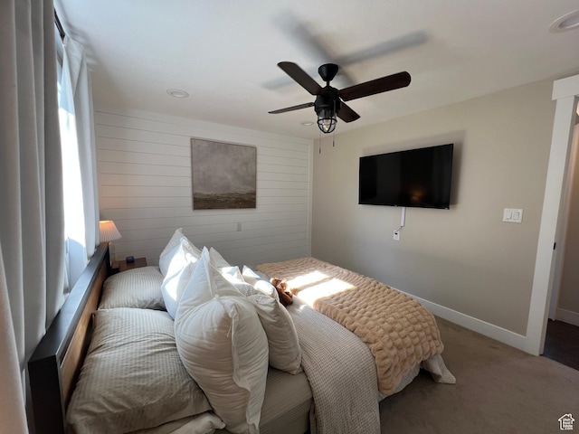 409 N 200 W, Brigham City, UT 84302 - carpeted bedroom featuring ceiling fan and wooden walls