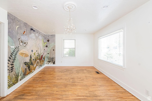 460 S 1074 E, Provo, UT 84606 - unfurnished room featuring a chandelier, light wood-type flooring, and recessed lighting
