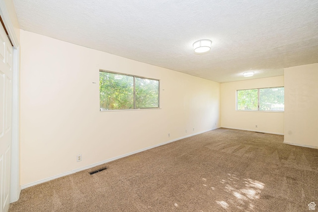 460 S 1074 E, Provo, UT 84606 - carpeted empty room featuring a textured ceiling and baseboards