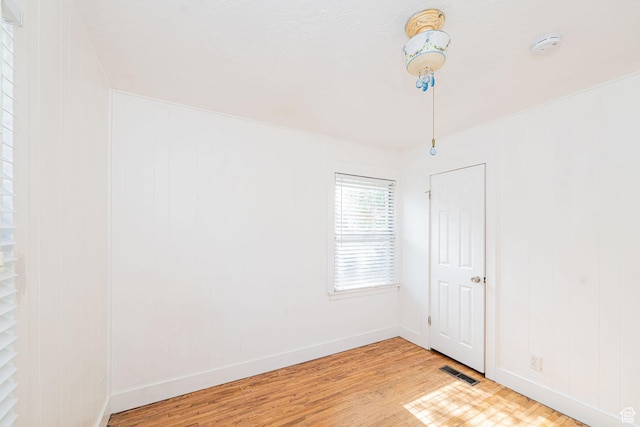 460 S 1074 E, Provo, UT 84606 - empty room with light wood-style floors and a smoke detector