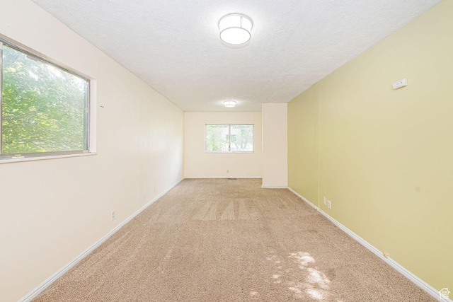 460 S 1074 E, Provo, UT 84606 - carpeted empty room with a textured ceiling and baseboards