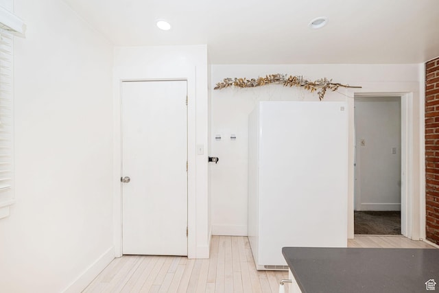 460 S 1074 E, Provo, UT 84606 - corridor with brick wall and light wood-style floors