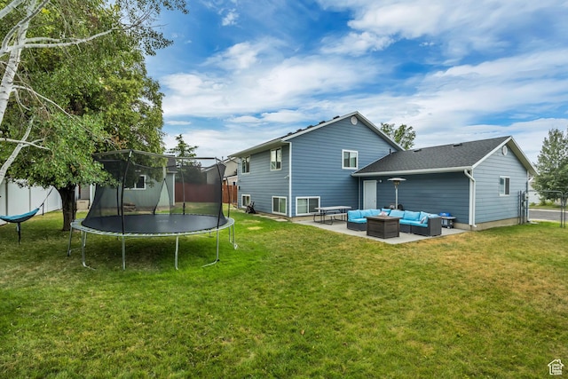 1492 N 1040 W, Orem, UT 84057 - back of property with an outdoor living space, a trampoline, a patio area, and a lawn