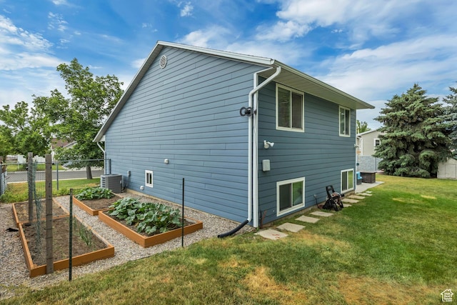 1492 N 1040 W, Orem, UT 84057 - view of side of property with a garden and a central AC unit