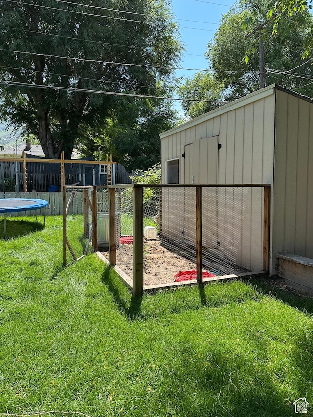 503 S Utah Ave, Provo, UT 84606 - view of yard featuring a trampoline and an outbuilding
