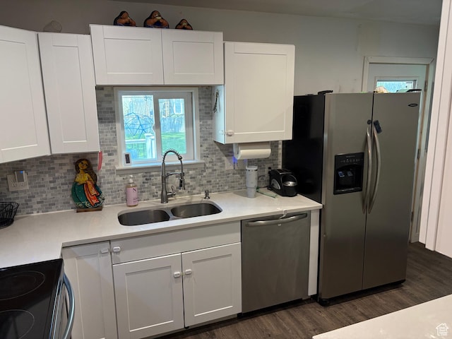 503 S Utah Ave, Provo, UT 84606 - kitchen with appliances with stainless steel finishes, white cabinetry, backsplash, and dark wood-type flooring