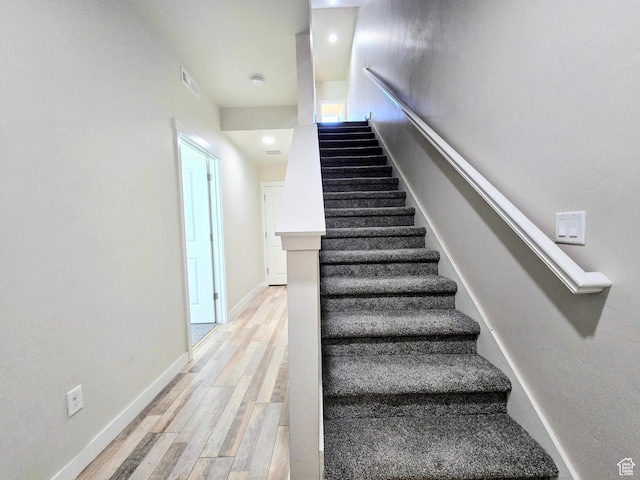 5149 W Arley Ct, Herriman, UT 84096 - stairway featuring wood finished floors and recessed lighting