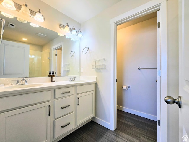 5149 W Arley Ct, Herriman, UT 84096 - full bath featuring double vanity, wood finish floors, and recessed lighting