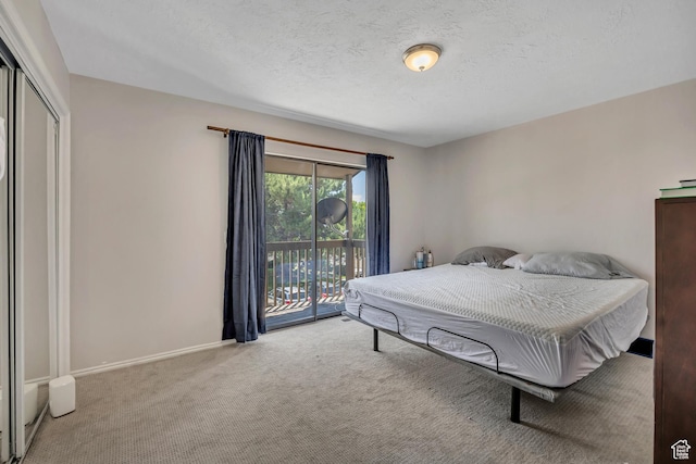 857 E 575 N, Layton, UT 84041 - bedroom with access to exterior, light colored carpet, a closet, and a textured ceiling