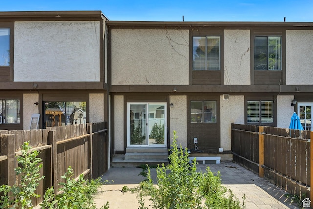 857 E 575 N, Layton, UT 84041 - back of property with stucco siding and entry steps