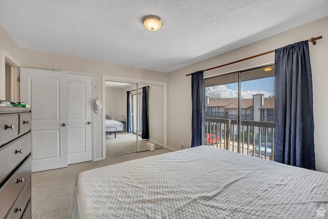 857 E 575 N, Layton, UT 84041 - bedroom with carpet flooring, access to exterior, and a textured ceiling