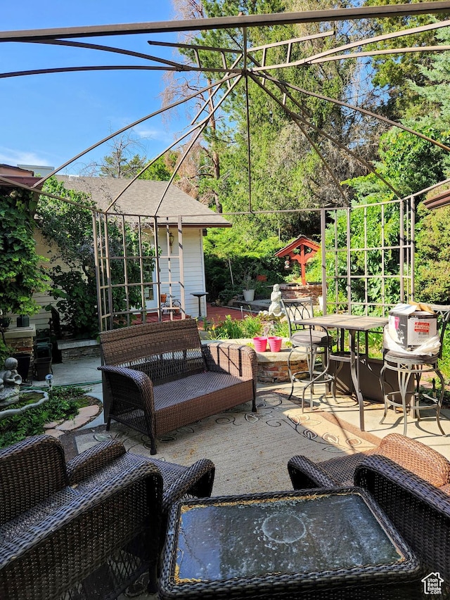 8857 S Capella Way E, Sandy, UT 84093 - view of patio / terrace with outdoor dining area and an outdoor living space