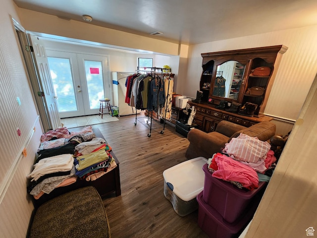 8857 S Capella Way E, Sandy, UT 84093 - living area featuring french doors and wood finished floors