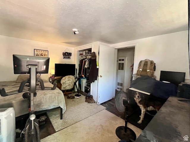 221 E 200 N, Moab, UT 84532 - bedroom with a closet and concrete flooring