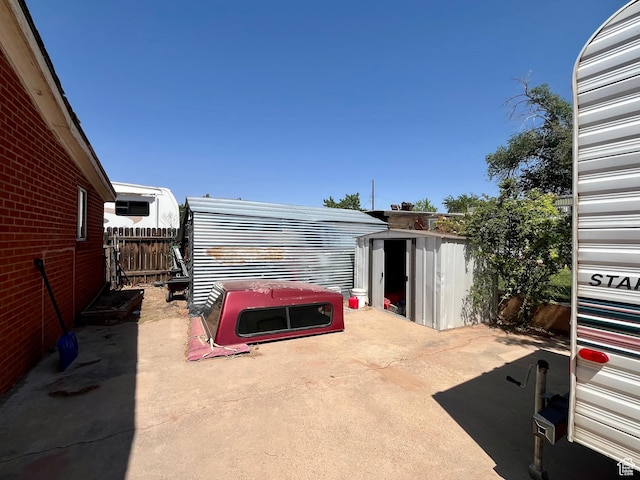 221 E 200 N, Moab, UT 84532 - view of parking / parking lot with a shed