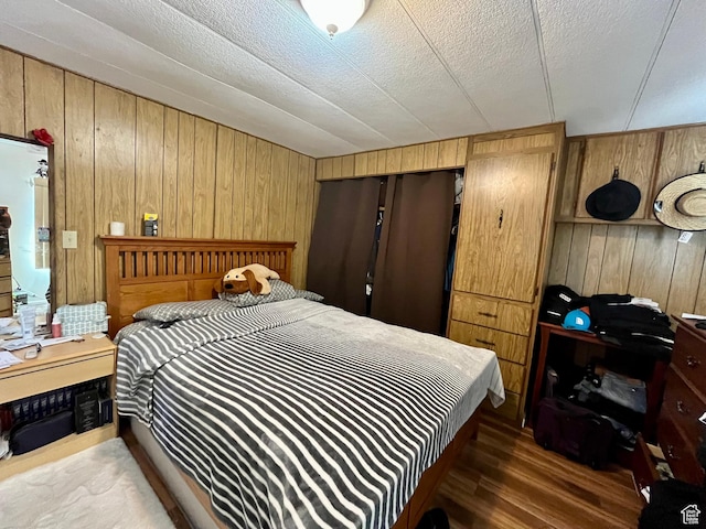 221 E 200 N, Moab, UT 84532 - bedroom featuring wood walls and wood finished floors
