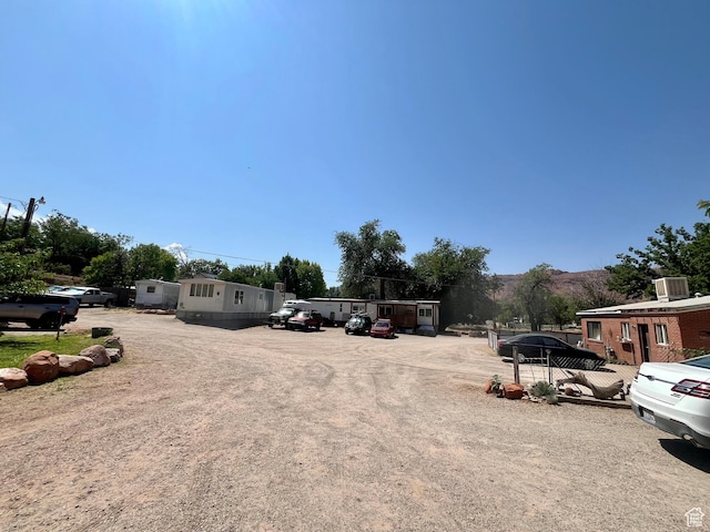 221 E 200 N, Moab, UT 84532 - uncovered parking lot featuring a mountain view