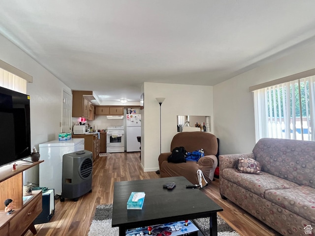 221 E 200 N, Moab, UT 84532 - living room with wood finished floors and washer / dryer