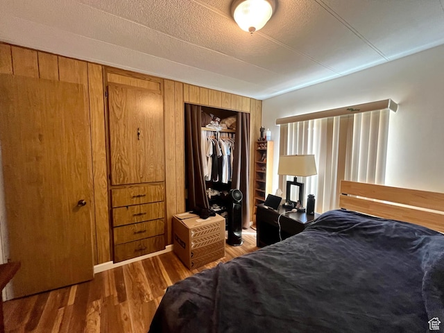 221 E 200 N, Moab, UT 84532 - bedroom featuring wood finished floors and a closet
