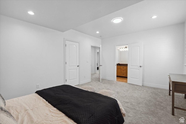 12469 S Patriot Hill Way, Herriman, UT 84096 - bedroom featuring light carpet, recessed lighting, and ensuite bathroom
