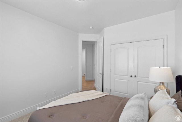 12469 S Patriot Hill Way, Herriman, UT 84096 - bedroom with baseboards and a closet