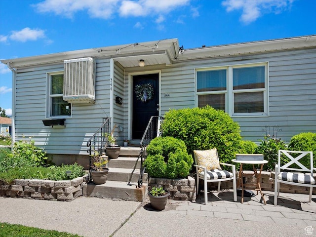344 E Utopia Ave, South Salt Lake, UT 84115 - view of front of property with a patio area