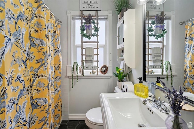 344 E Utopia Ave, South Salt Lake, UT 84115 - bathroom featuring curtained shower and tile patterned floors