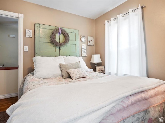 344 E Utopia Ave, South Salt Lake, UT 84115 - bedroom with wood finished floors and baseboards