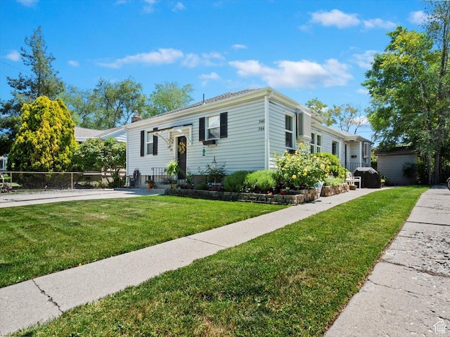 344 E Utopia Ave, South Salt Lake, UT 84115 - view of front of house with a front lawn and a chimney