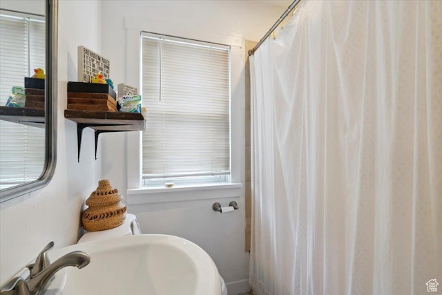 344 E Utopia Ave, South Salt Lake, UT 84115 - full bathroom with a sink and a shower with shower curtain