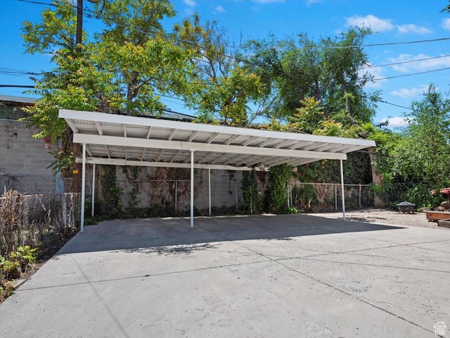 344 E Utopia Ave, South Salt Lake, UT 84115 - view of vehicle parking with a detached carport and concrete driveway
