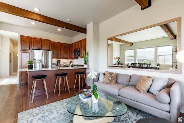6169 Park Ln S Unit 36, Park City, UT 84098 - living area with beamed ceiling, recessed lighting, and hardwood / wood-style flooring