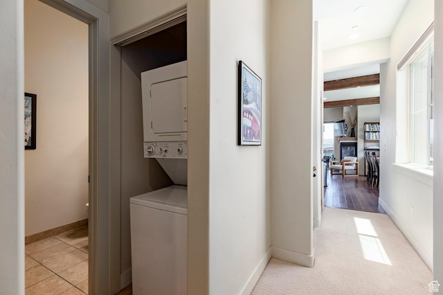 6169 Park Ln S Unit 36, Park City, UT 84098 - laundry area with stacked washer / drying machine and baseboards