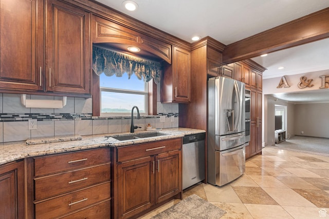 2214 S 1600 E, Preston, ID 83263 - kitchen featuring appliances with stainless steel finishes, backsplash, light stone counters, and recessed lighting