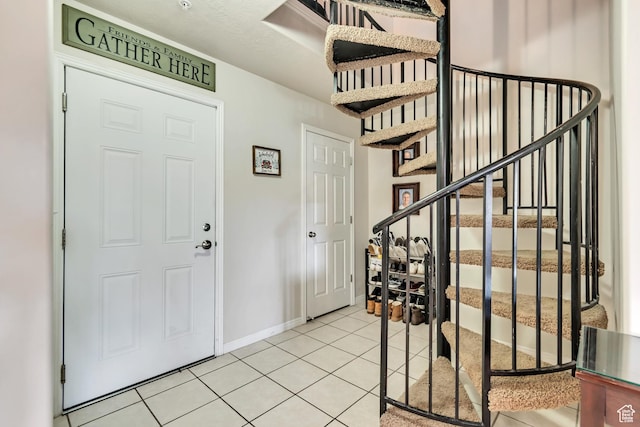 1245 E Privet Dr S Unit B3-427, Cottonwood Heights, UT 84121 - foyer entrance featuring light tile patterned floors and stairway