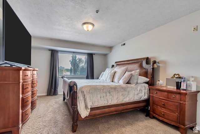 1245 E Privet Dr S Unit B3-427, Cottonwood Heights, UT 84121 - bedroom featuring light colored carpet and a textured ceiling