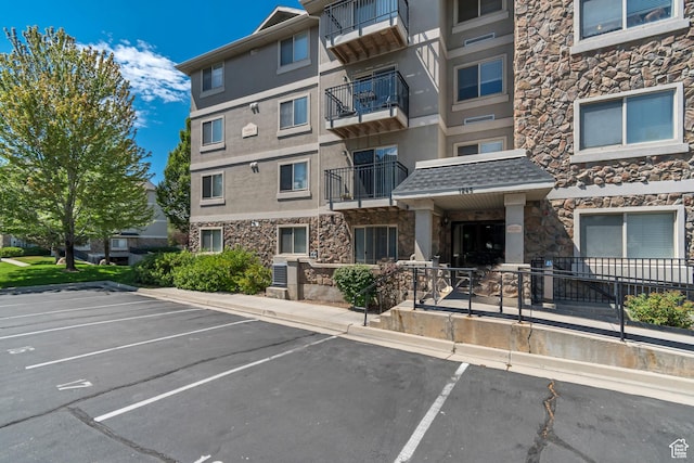 1245 E Privet Dr S Unit B3-427, Cottonwood Heights, UT 84121 - view of property with uncovered parking