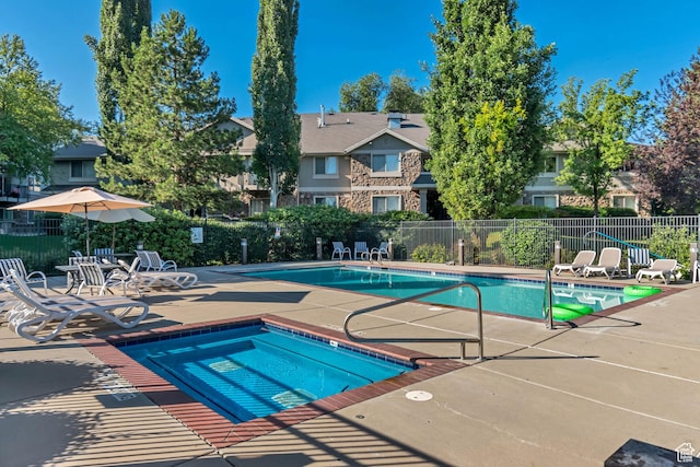 1245 E Privet Dr S Unit B3-427, Cottonwood Heights, UT 84121 - community pool featuring a patio